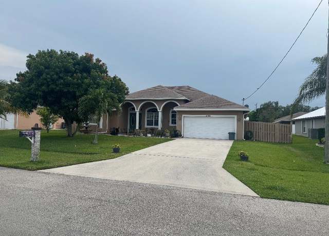 Property at 5760 NW Cleburn Dr, Port Saint Lucie, FL 34986, 4 beds, 3 baths