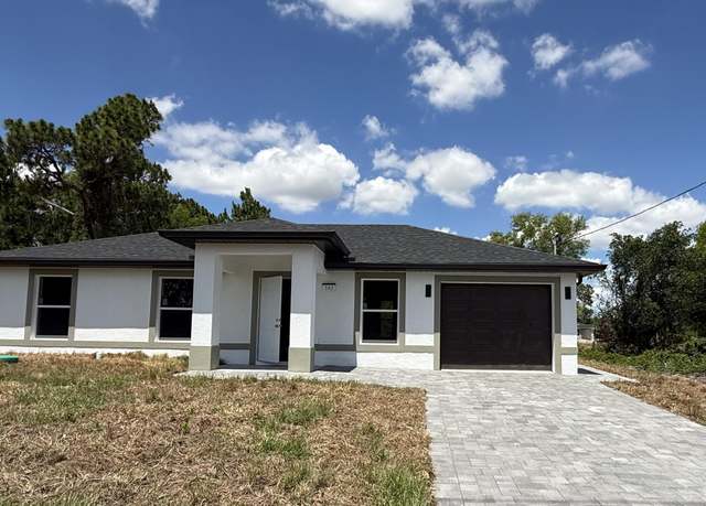 Property at 382 Mcarthur Blvd, Lehigh Acres, FL 33974, 3 beds, 2 baths