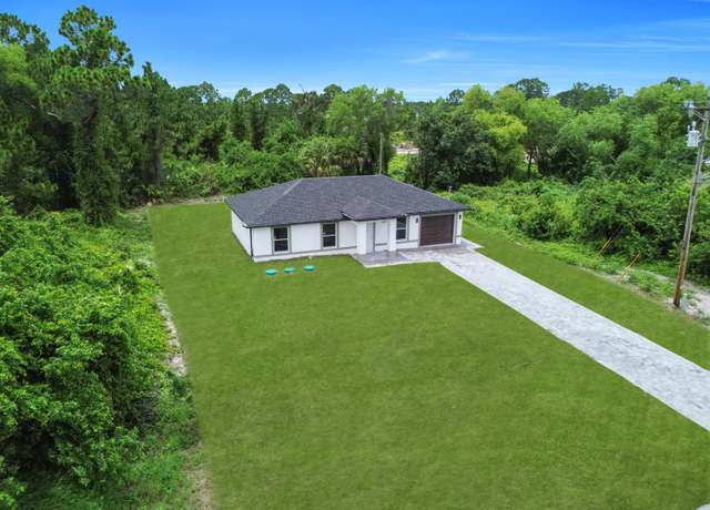 Property at 382 Mcarthur Blvd, Lehigh Acres, FL 33974, 3 beds, 2 baths