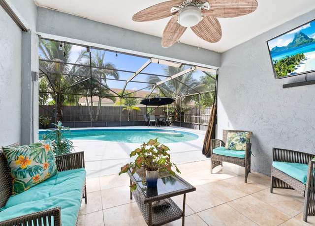 Property at 5280 SE Dell St, Stuart, FL 34997, 4 beds, 2 baths