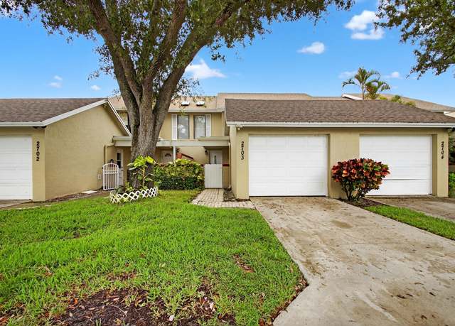 Property at 2703 Maplewood Drive Dr, Greenacres, FL 33415, 3 beds, 2.5 baths