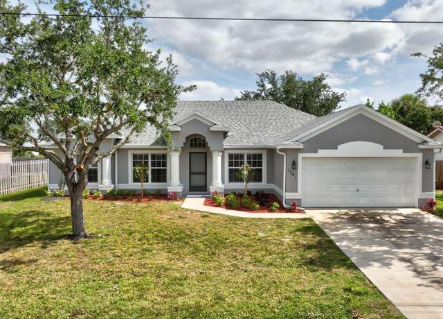 Property at 1381 SW Bougainvillea Ave, Port Saint Lucie, FL 34953, 4 beds, 2 baths