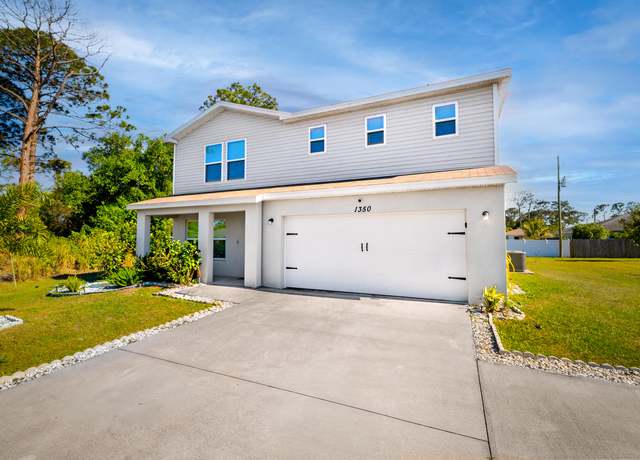 Property at 1350 SW Paar Dr, Port Saint Lucie, FL 34953, 4 beds, 3 baths