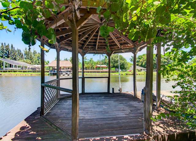 Property at 420 Santa Fe Rd, West Palm Beach, FL 33406, 4 beds, 4 baths