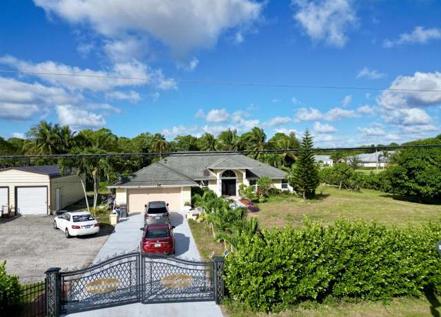 Property at 7775 120th Ave N, The Acreage, FL 33412, 5 beds, 2 baths