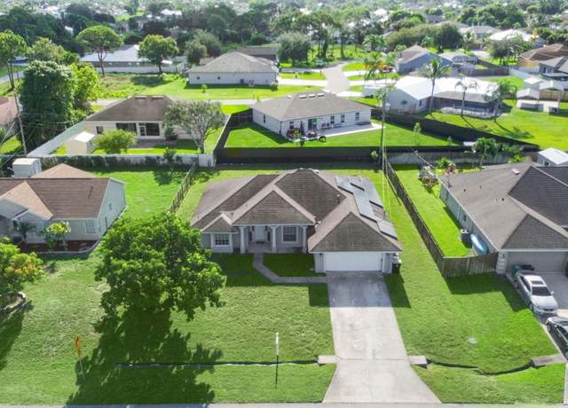 Property at 4417 SW Idlewild St, Port Saint Lucie, FL 34953, 3 beds, 2 baths