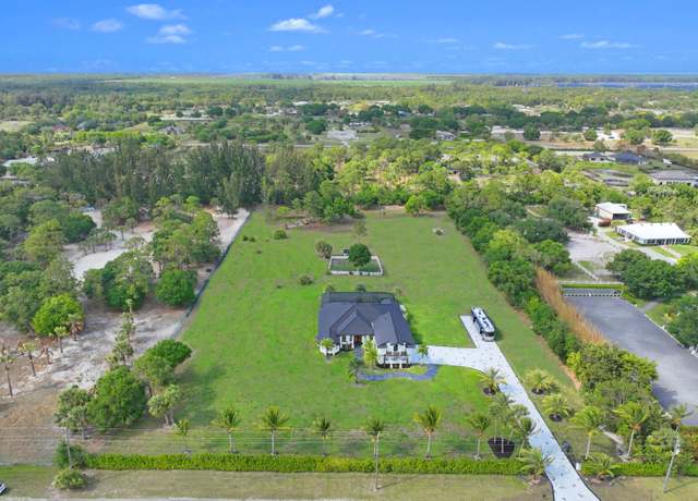Property at 19361 W Sycamore Dr, The Acreage, FL 33470, 5 beds, 4 baths