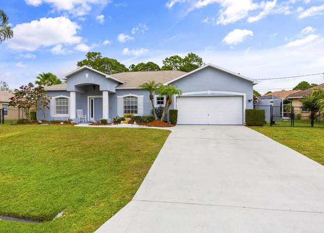 Property at 6154 NW East Deville Cir, Port Saint Lucie, FL 34986, 3 beds, 2 baths