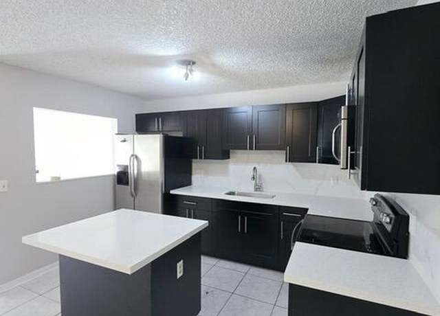 Property at 4320 Woodstock Dr Unit D, West Palm Beach, FL 33409, 2 beds, 2 baths