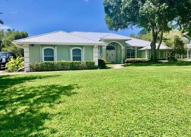 Property at 5530 SW Orchid Bay Dr, Palm City, FL 34990, 4 beds, 3 baths