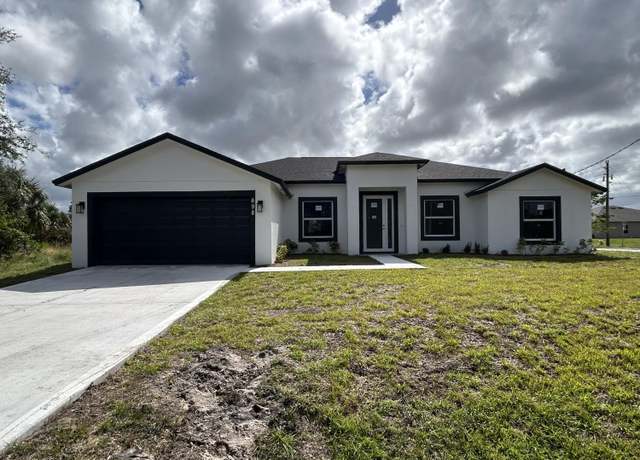Property at 698 Mexia St SW, Palm Bay, FL 32908, 4 beds, 3 baths