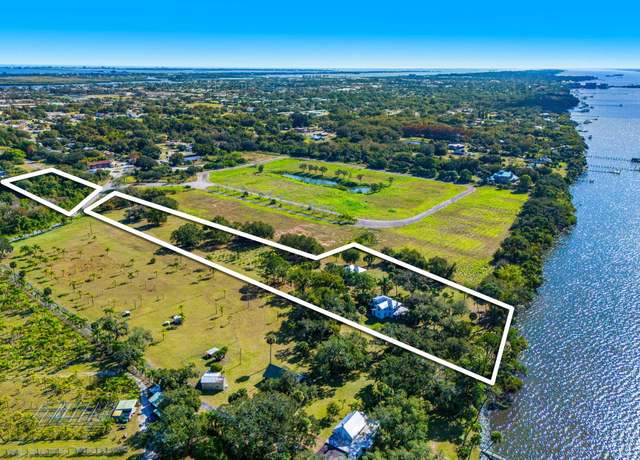 Property at 1605 N Tropical Trl, Merritt Island, FL 32953, 6 beds, 3 baths