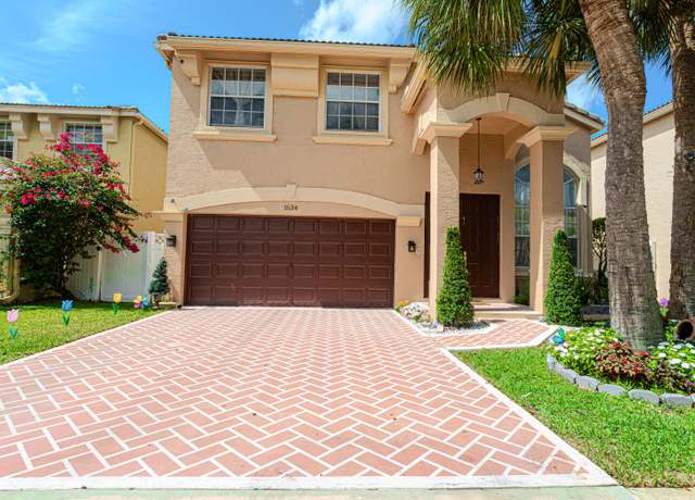 Property at 1534 Running Oak Ln, Royal Palm Beach, FL 33411, 4 beds, 3 baths