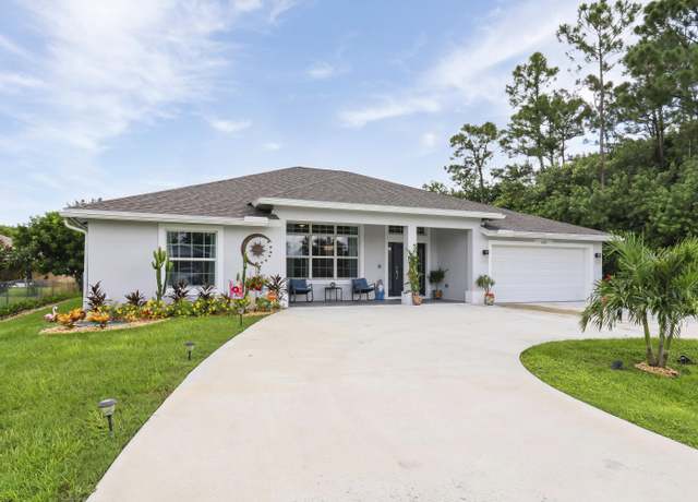 Property at 145 SW Oakridge Dr, Port Saint Lucie, FL 34984, 4 beds, 3.5 baths