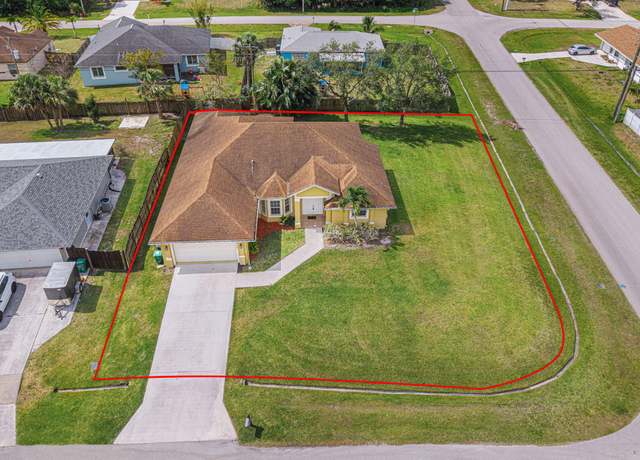 Property at 1490 SW Dow Ln, Port Saint Lucie, FL 34953, 4 beds, 3 baths