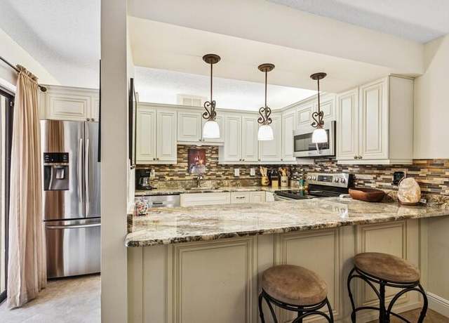 Property at 7 Atrium Cir Unit D, Atlantis, FL 33462, 3 beds, 2.5 baths