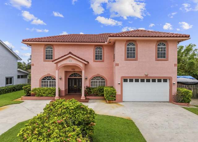 Property at 1820 Carambola Rd, Lake Clarke Shores, FL 33406, 5 beds, 3.5 baths