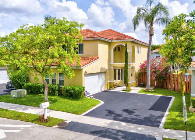 Property at 4749 NW 5 Ct, Coconut Creek, FL 33063, 4 beds, 2.5 baths