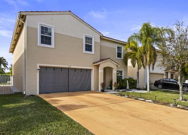 Property at 6627 Rainwood Cove Ln, Lake Worth, FL 33463, 6 beds, 3 baths