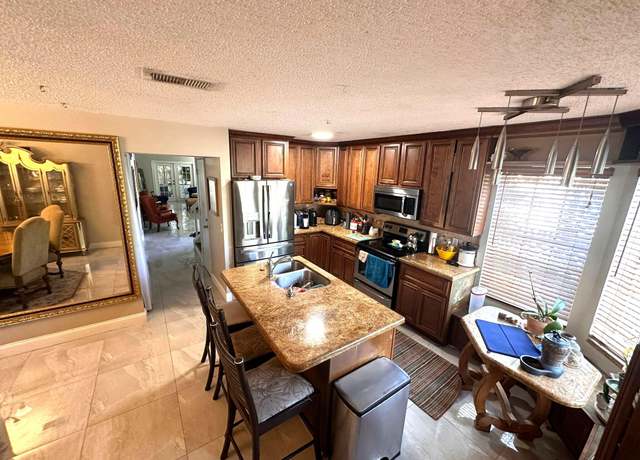 Property at 5473 E Berry Blossom Way E, West Palm Beach, FL 33415, 3 beds, 3 baths