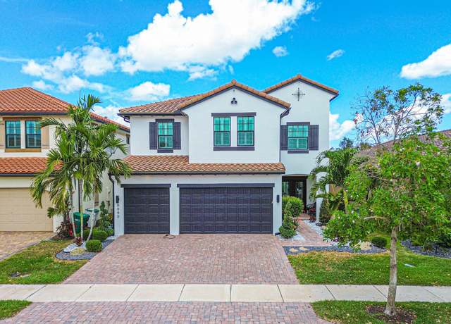 Property at 8640 E Baypoint Cir, Parkland, FL 33076, 5 beds, 4 baths