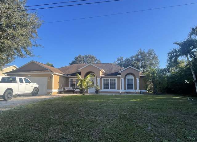 Property at 404 SW Balfour Ave SW, Port Saint Lucie, FL 34953, 4 beds, 2 baths