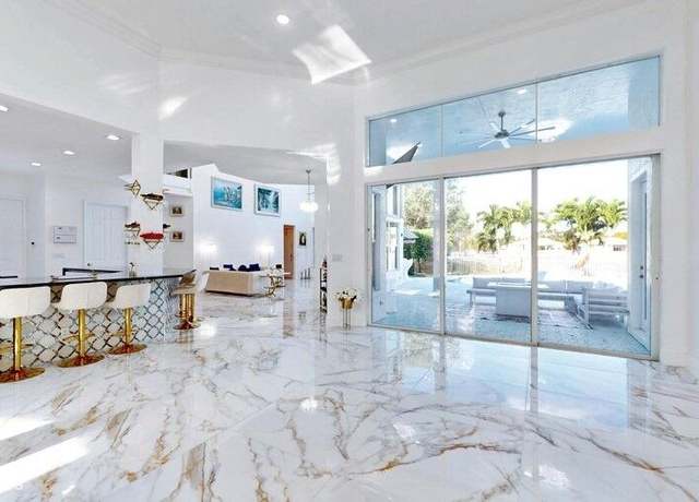 Property at 11910 Osprey Point Cir, Wellington, FL 33449, 5 beds, 4 baths