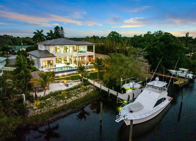 Property at 668 SW Hidden River Ave, Palm City, FL 34990, 4 beds, 5 baths