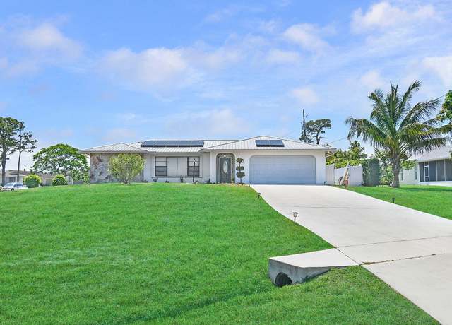 Property at 397 NE Gulfstream Ave, Port Saint Lucie, FL 34983, 3 beds, 2 baths