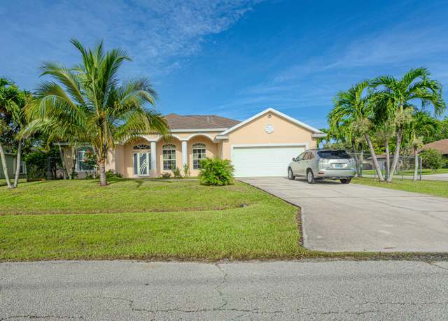 Property at 1518 SW Hutchins St, Port Saint Lucie, FL 34983, 4 beds, 3 baths