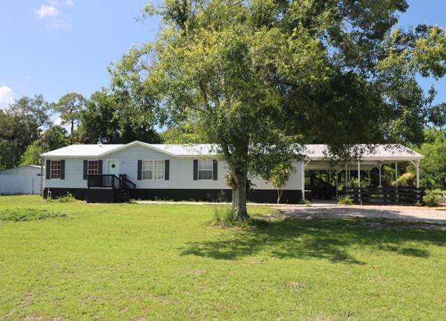 Property at 7050 NE 1st St, Okeechobee, FL 34974, 3 beds, 2 baths