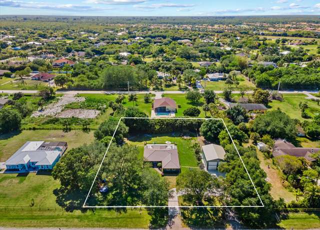Property at 16629 74th Ave N, Palm Beach Gardens, FL 33418, 4 beds, 2 baths