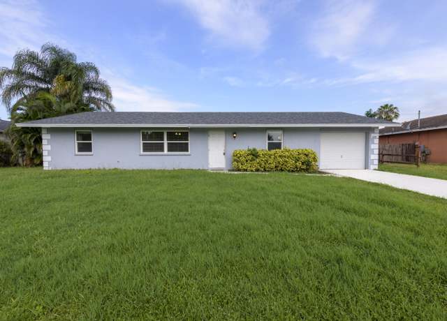 Property at 2458 SW Hinchman St, Port Saint Lucie, FL 34984, 3 beds, 2 baths