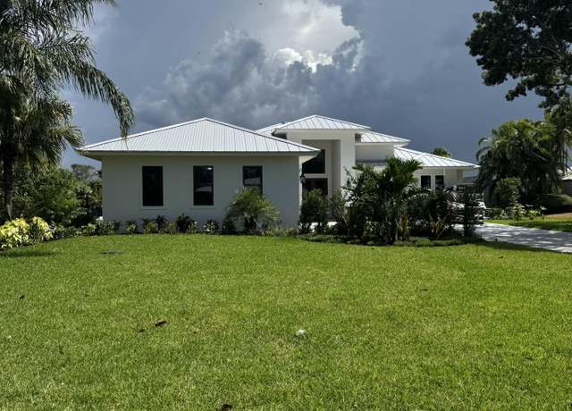 Property at 1064 NW Spruce Ridge Dr, Stuart, FL 34994, 4 beds, 4.5 baths