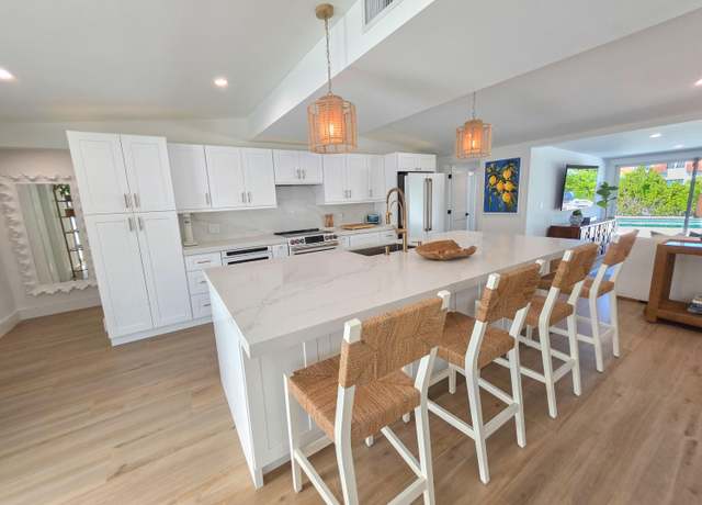Property at 720 Eastwind Dr, North Palm Beach, FL 33408, 2 beds, 2.5 baths