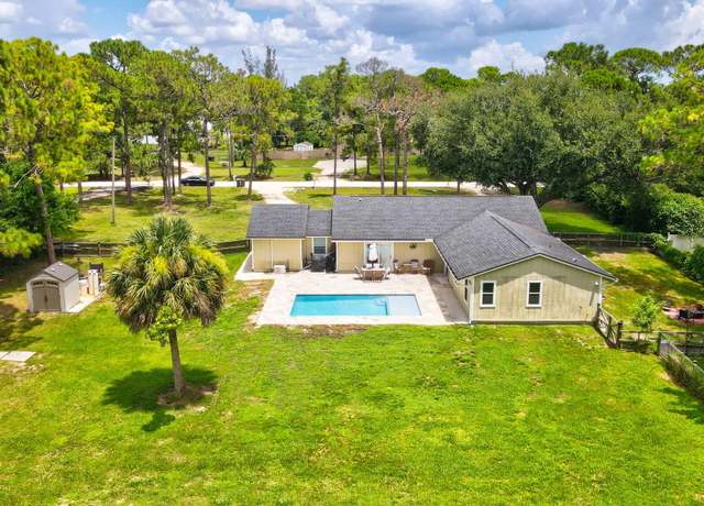 Property at 11616 56th Pl N, West Palm Beach, FL 33411, 5 beds, 3 baths