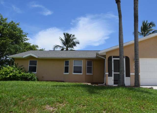 Property at 702 SW Arkansas Ter, Port Saint Lucie, FL 34953, 3 beds, 2 baths