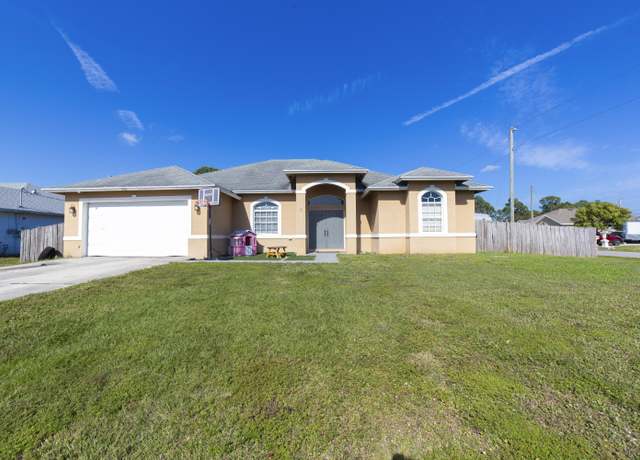 Property at 901 SW Versailles Ave, Port Saint Lucie, FL 34953, 3 beds, 2 baths
