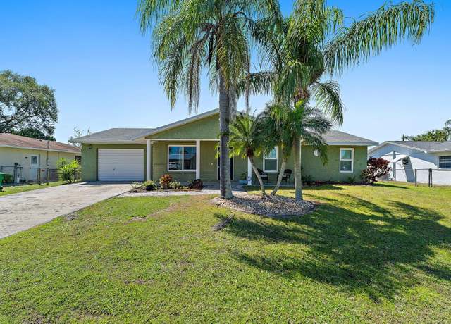 Property at 422 SE Lamon Ln, Port Saint Lucie, FL 34983, 4 beds, 3 baths