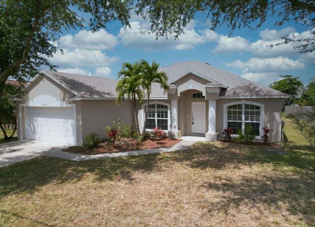 Property at 518 SE Nome Dr, Port Saint Lucie, FL 34984, 4 beds, 2 baths