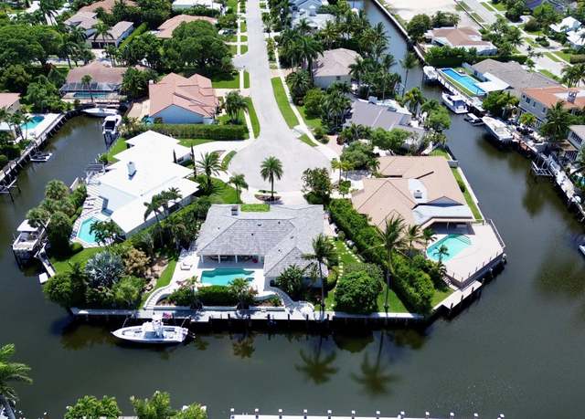 Property at 830 NE Boca Bay Colony Dr, Boca Raton, FL 33487, 4 beds, 2.5 baths