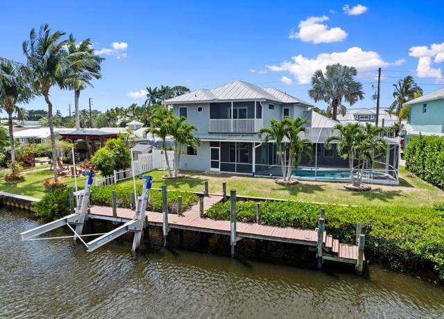 Property at 1599 SW Dyer Point Rd, Palm City, FL 34990, 3 beds, 2.5 baths
