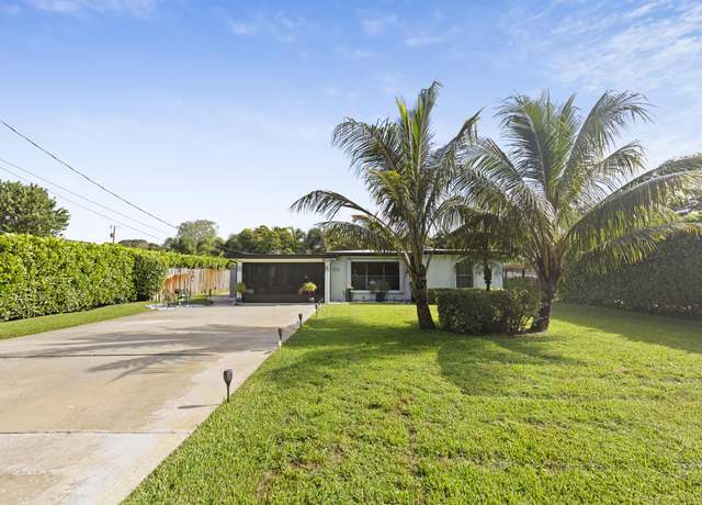 Property at 2417 Country Oaks Ln, Palm Beach Gardens, FL 33410, 3 beds, 1.5 baths