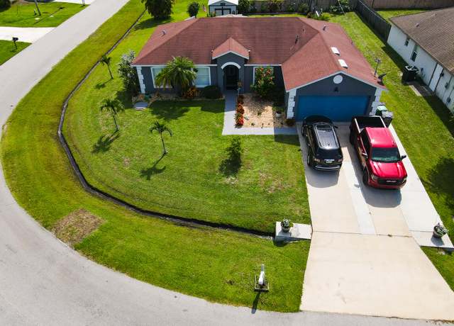 Property at 2080 SW Hampshire Ln, Port Saint Lucie, FL 34953, 4 beds, 2 baths