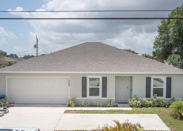 Property at 1042 SW California Blvd, Port Saint Lucie, FL 34953, 3 beds, 2 baths