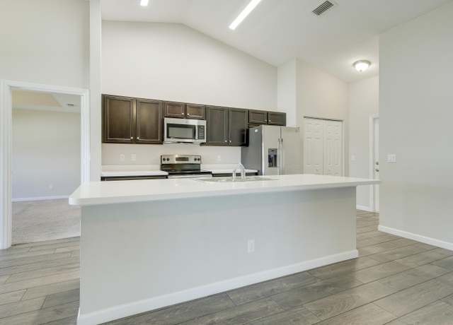 Property at 3631 SW Kromrey St, Port Saint Lucie, FL 34953, 4 beds, 2 baths