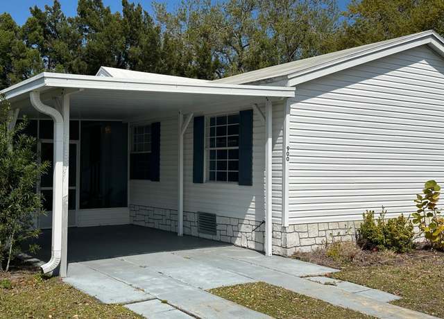 Property at 900 Cashew Cir, Barefoot Bay, FL 32976, 3 beds, 2 baths