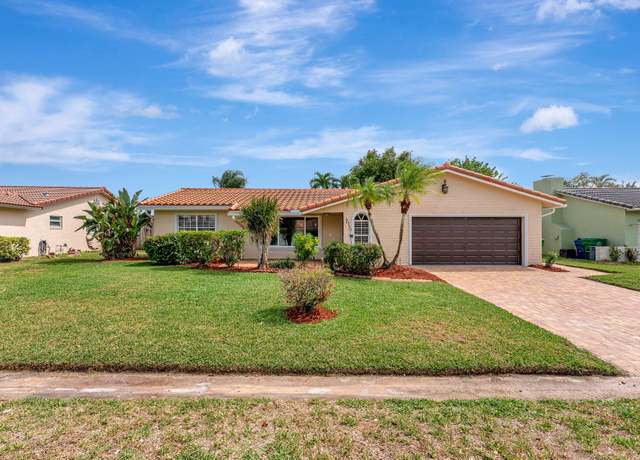 Property at 12120 NW 31st Dr, Coral Springs, FL 33065, 4 beds, 2 baths
