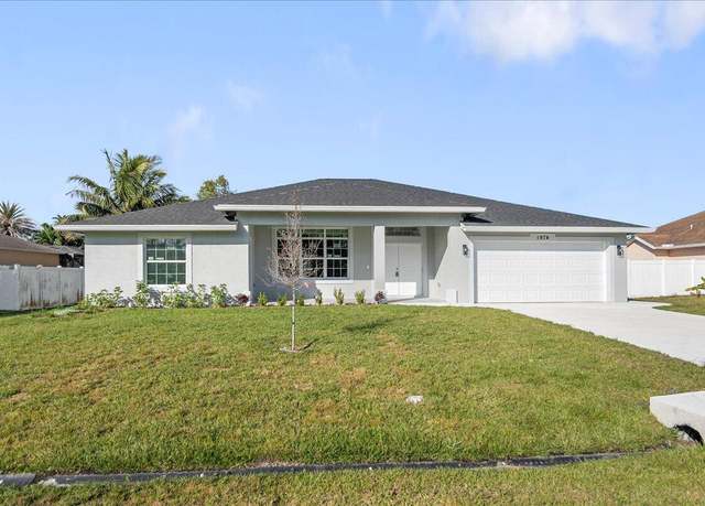 Property at 1974 SW Cranberry St, Port Saint Lucie, FL 34952, 4 beds, 3.5 baths