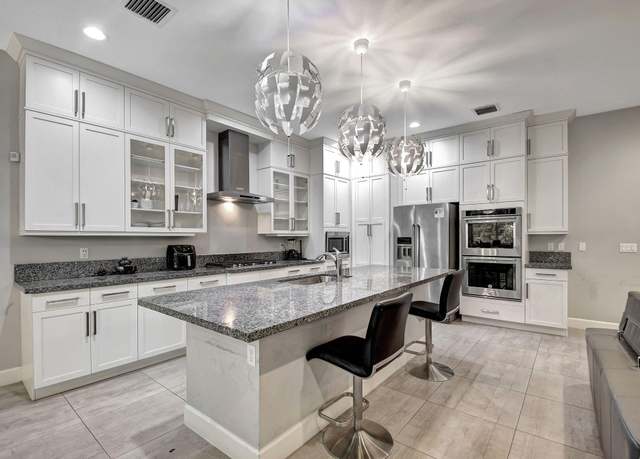 Property at 5209 Beland Dr, Lake Worth, FL 33467, 4 beds, 3.5 baths